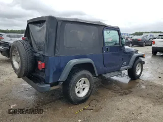 2005 Jeep Wrangler Unlimited with VIN 1J4FA44S95P335275, listed as a Copart auction lot 70788864 with 152,096 mi miles and Salvage Title. Bid and sale history available at carsss.com. Image 3.