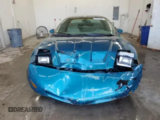 1995 Pontiac Firebird Firebird z VIN 2G2FS22S7S2240523, wystawiony jako Copart lot #57970545 z przebiegiem 119 682 mil mil oraz Szkoda całkowita • Salvage title. Historia ofert i sprzedaży dostępna na DreamBid. Obrazek 5.