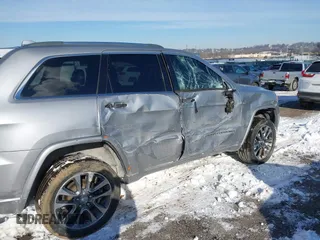 2018 Jeep Grand Cherokee High Altitude with VIN 1C4RJFCG5JC355584, listed as a IAAI auction lot 41403722 with 96,273 mi miles. Bid and sale history available at carsss.com. Image 6.