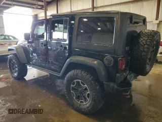 2014 Jeep Wrangler Unlimited Rubicon X with VIN 1C4HJWFG6EL191369, listed as a Copart auction lot 55748165 with 151,522 mi miles and Salvage title. Bid and sale history available at DreamBid. Image 2.