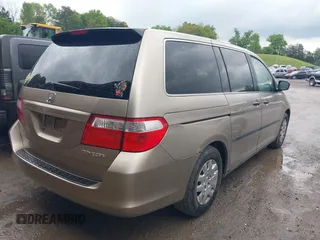 2005 Honda Odyssey LX with VIN 5FNRL382X5B116840, listed as a IAAI auction lot 42070477 with 268,898 mi miles. Bid and sale history available at carsss.com. Image 4.