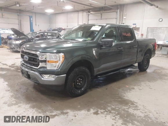 2021 Ford F-150 XL with VIN 1FTFW1E59MKD82204, listed as a IAAI auction lot 41466186 with 56,839 mi miles. Bid and sale history available at carsss.com. Image 2.