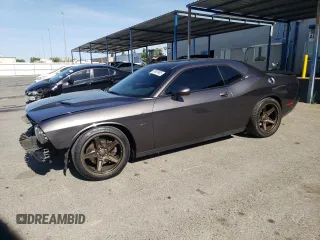 2015 Dodge Challenger R/T Plus with VIN 2C3CDZBT0FH885371, listed as a Copart auction lot 58959965 with 89,954 mi miles and Salvage title. Bid and sale history available at DreamBid. Image 1.
