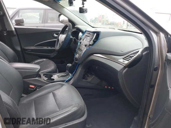 2013 Hyundai Santa Fe Sport z VIN 5XYZU3LA4DG085412, wystawiony jako IAAI lot #42016302 z przebiegiem 121 484 mil mil oraz . Historia ofert i sprzedaży dostępna na DreamBid. Obrazek 5.