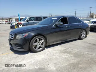 2017 Mercedes-Benz E 300 Luxury with VIN WDDZF4JBXHA099063, listed as a Copart auction lot 57705935 with 51,882 mi miles and Salvage title. Bid and sale history available at DreamBid. Image 1.