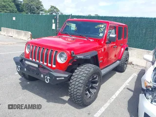 2021 Jeep Wrangler Unlimited Sahara z VIN 1C4HJXEGXMW631033, wystawiony jako IAAI lot #42550070 z przebiegiem 54 429 mil mil oraz . Historia ofert i sprzedaży dostępna na DreamBid. Obrazek 18.