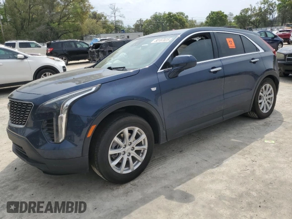 2022 Cadillac XT4 FWD Luxury z VIN 1GYAZAR47NF120348, wystawiony jako Copart lot #50187025 z przebiegiem 76 886 mil mil oraz Nie do naprawy • Non repairable. Historia ofert i sprzedaży dostępna na DreamBid. Obrazek 1.