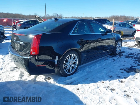 2013 Cadillac CTS Premium z VIN 1G6DS5E34D0160676, wystawiony jako IAAI lot #41262795 z przebiegiem 122 248 mil mil oraz . Historia ofert i sprzedaży dostępna na DreamBid. Obrazek 4.