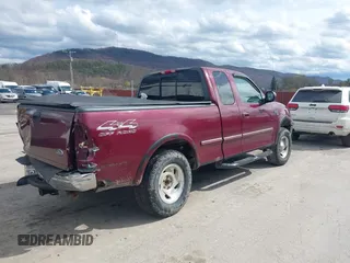 1998 Ford F-150 with VIN 1FTZX18W5WNC39962, listed as a IAAI auction lot 41951328 with 228,438 mi miles and . Bid and sale history available at DreamBid. Image 4.