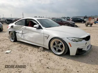 2015 BMW M4 with VIN WBS3R9C5XFK332533, listed as a Copart auction lot 57030615 with 97,739 mi miles and Salvage title. Bid and sale history available at DreamBid. Image 4.