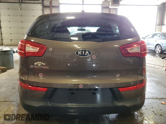 2012 Kia Sportage LX with VIN KNDPB3A28C7331687, listed as a Copart auction lot 60219055 with 87,591 mi miles and Salvage title. Bid and sale history available at DreamBid. Image 6.