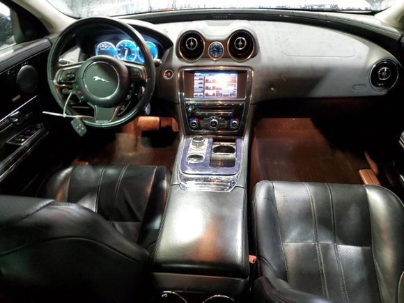 2013 Jaguar XJ with VIN SAJWJ1CD0D8V51078, listed as a Copart auction lot 46449265 with NaN miles and Salvage Title. Bid and sale history available at carsss.com. Image 8.
