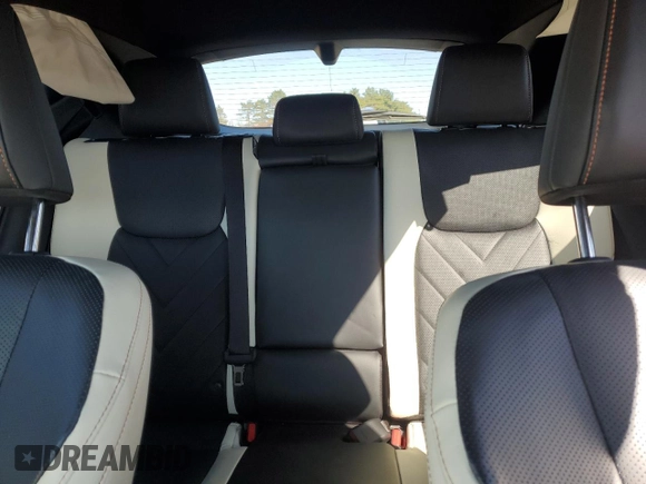 2024 Lexus NX 450h+ Luxury z VIN JTJHKCFZ0R2040386, wystawiony jako Copart lot #50497555 z przebiegiem 18 410 mil mil oraz Szkoda całkowita • Salvage title. Historia ofert i sprzedaży dostępna na DreamBid. Obrazek 10.