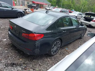 2018 BMW 5 Series 540i xDrive with VIN WBAJE7C58JG891098, listed as a IAAI auction lot 42331320 with 55,172 mi miles and . Bid and sale history available at DreamBid. Image 4.