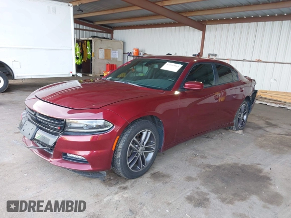 2019 Dodge Charger SXT with VIN 2C3CDXJG0KH757909, listed as a IAAI auction lot 41597907 with 71,882 mi miles and . Bid and sale history available at DreamBid. Image 17.