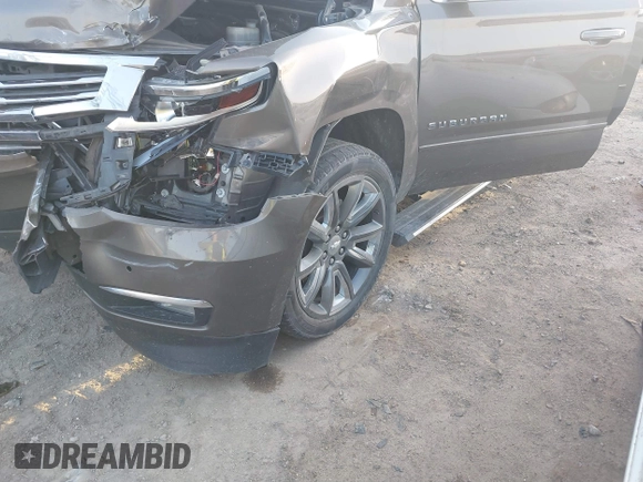 2015 Chevrolet Suburban LTZ with VIN 1GNSKKKC1FR628182, listed as a IAAI auction lot 41801391 with Not Provided miles and . Bid and sale history available at DreamBid. Image 17.