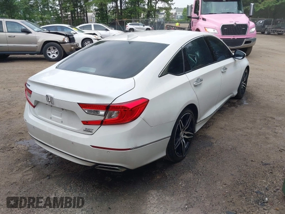 2021 Honda Accord Touring with VIN 1HGCV2F96MA018262, listed as a IAAI auction lot 42498042 with 66,038 mi miles and . Bid and sale history available at DreamBid. Image 4.