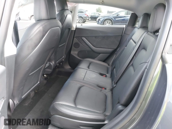 2022 Tesla Model Y Long Range with VIN 7SAYGAEE6NF341827, listed as a IAAI auction lot 41946388 with Not Provided miles and . Bid and sale history available at DreamBid. Image 8.