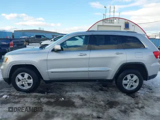 2011 Jeep Grand Cherokee Laredo with VIN 1J4RR4GG7BC584500, listed as a IAAI auction lot 41383355 with 161,722 mi miles. Bid and sale history available at carsss.com. Image 14.