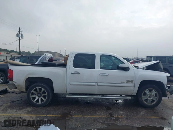 2013 Chevrolet Silverado 1500 LT with VIN 3GCPCSE02DG170890, listed as a IAAI auction lot 41462129 with 140,958 mi miles and . Bid and sale history available at DreamBid. Image 13.