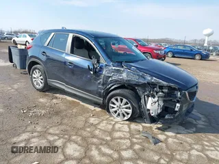 2015 Mazda CX-5 Touring with VIN JM3KE2CY0F0516589, listed as a IAAI auction lot 41707973 with 109,245 mi miles. Bid and sale history available at carsss.com. Image 1.