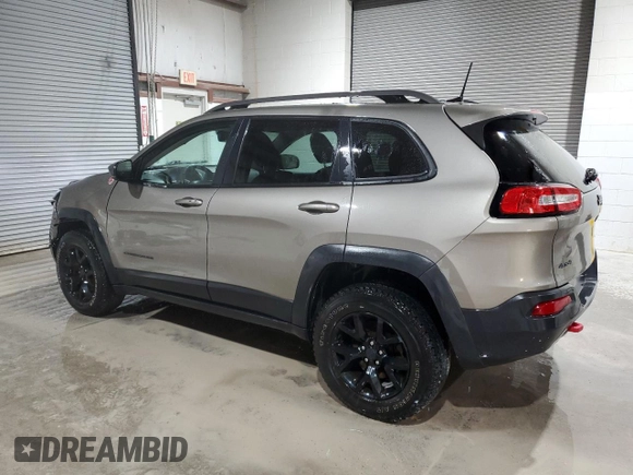 2017 Jeep Cherokee Trailhawk L Plus z VIN 1C4PJMBB4HW593615, wystawiony jako Copart lot #56342885 z przebiegiem 88 215 mil mil oraz Szkoda całkowita • Salvage title. Historia ofert i sprzedaży dostępna na DreamBid. Obrazek 2.