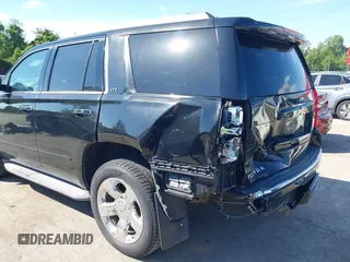2015 Chevrolet Tahoe LTZ z VIN 1GNSKCKC3FR104845, wystawiony jako IAAI lot #42291785 z przebiegiem 75 047 mil mil oraz . Historia ofert i sprzedaży dostępna na DreamBid. Obrazek 6.