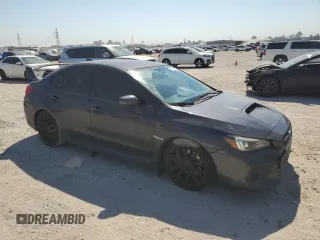 2018 Subaru WRX STI Launch with VIN JF1VA2W61J9820794, listed as a Copart auction lot 76299864 with 137,498 mi miles and Salvage title. Bid and sale history available at DreamBid. Image 4.