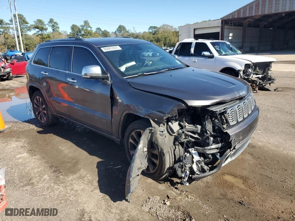 2017 Jeep Grand Cherokee Overland with VIN 1C4RJECGXHC696676, listed as a Copart auction lot 86885924 with 154,754 mi miles and Salvage Title. Bid and sale history available at carsss.com. Image 4.