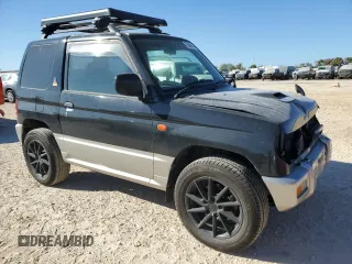 1996 Mitsubishi Montero z VIN H56A0209464, wystawiony jako Copart lot #76590414 z przebiegiem 112 578 mil mil oraz Szkoda całkowita • Salvage title. Historia ofert i sprzedaży dostępna na DreamBid. Obrazek 4.