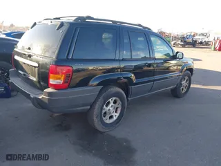 2001 Jeep Grand Cherokee Laredo with VIN 1J4GW48S51C517217, listed as a IAAI auction lot 41773968 with 189,350 mi miles. Bid and sale history available at carsss.com. Image 4.