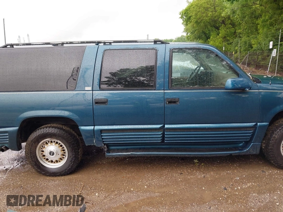 1995 GMC Suburban with VIN 1GDFK16K8SJ741041, listed as a IAAI auction lot 42315676 with 159,312 mi miles and . Bid and sale history available at DreamBid. Image 13.