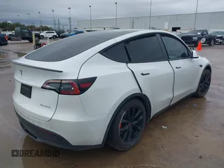 2022 Tesla Model Y Performance with VIN 7SAYGDEF1NF456829, listed as a IAAI auction lot 41448425 with 41,380 mi miles and . Bid and sale history available at DreamBid. Image 4.