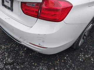 2013 BMW 3 Series 328i xDrive with VIN WBA3B5C50DF598490, listed as a IAAI auction lot 41159038 with Not provided miles and . Bid and sale history available at DreamBid. Image 6.