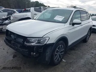 2021 Volkswagen Tiguan S with VIN 3VV1B7AX5MM045667, listed as a IAAI auction lot 41256945 with 90,523 mi miles. Bid and sale history available at carsss.com. Image 2.