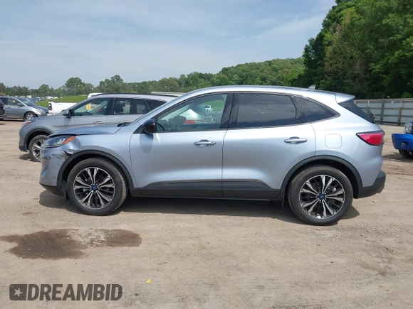 2022 Ford Escape SE z VIN 1FMCU0G68NUB64197, wystawiony jako IAAI lot #42279268 z przebiegiem 10 579 mil mil oraz . Historia ofert i sprzedaży dostępna na DreamBid. Obrazek 14.