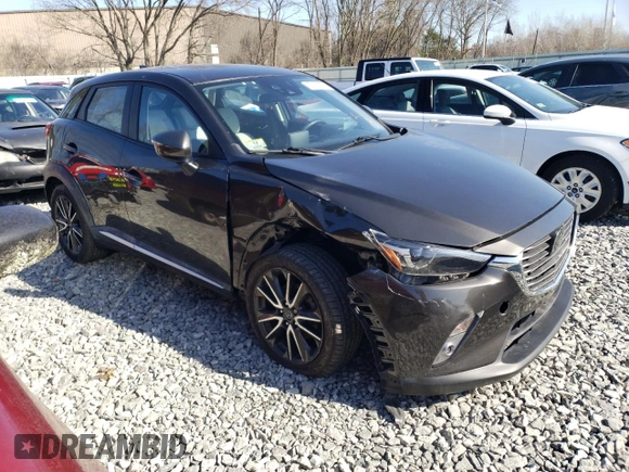 2016 Mazda CX-3 Grand Touring z VIN JM1DKBD7XG0107274, wystawiony jako Copart lot #52137385 z przebiegiem 35 376 mil mil oraz Szkoda całkowita • Salvage title. Historia ofert i sprzedaży dostępna na DreamBid. Obrazek 4.