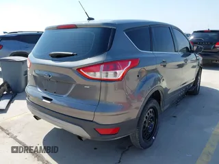 2014 Ford Escape SE with VIN 1FMCU0GX8EUD57801, listed as a IAAI auction lot 41856252 with 136,980 mi miles. Bid and sale history available at carsss.com. Image 4.