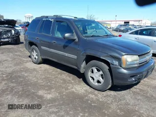 2004 Chevrolet TrailBlazer LS with VIN 1GNDT13S142391821, listed as a IAAI auction lot 41860650 with 184,915 mi miles. Bid and sale history available at carsss.com. Image 1.