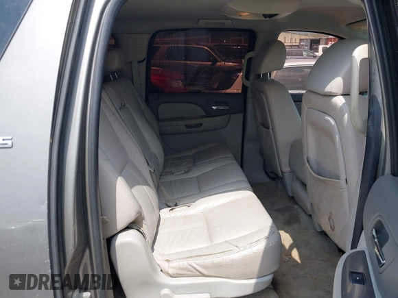 2007 Chevrolet Suburban LS with VIN 1GNFC160X7J233586, listed as a IAAI auction lot 42165186 with 240,183 mi miles and . Bid and sale history available at DreamBid. Image 8.