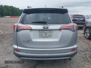 2018 Toyota RAV4 XLE with VIN 2T3WFREV4JW486939, listed as a IAAI auction lot 42355448 with 133,655 mi miles and . Bid and sale history available at DreamBid. Image 16.