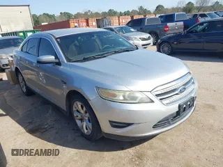 2011 Ford Taurus SEL z VIN 1FAHP2HWXBG118768, wystawiony jako IAAI lot #41736919 z przebiegiem 203 827 mil mil oraz . Historia ofert i sprzedaży dostępna na DreamBid. Obrazek 1.