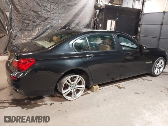 2014 BMW 7 Series ALPINA B7 xDrive with VIN WBAYF8C53ED141858, listed as a IAAI auction lot 40987098 with 128,404 mi miles and . Bid and sale history available at DreamBid. Image 6.