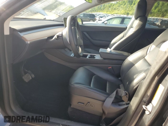 2022 Tesla Model Y Long Range z VIN 7SAYGDEE1NF430383, wystawiony jako Copart lot #56208825 z przebiegiem 60 612 mil mil oraz Szkoda całkowita • Salvage title. Historia ofert i sprzedaży dostępna na DreamBid. Obrazek 7.
