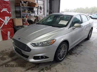 2013 Ford Fusion SE Hybrid with VIN 3FA6P0LU2DR319335, listed as a IAAI auction lot 42007573 with 135,099 mi miles. Bid and sale history available at carsss.com. Image 2.