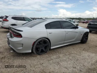 2019 Dodge Charger Scat Pack with VIN 2C3CDXGJ0KH688805, listed as a Copart auction lot 50822835 with 71,827 mi miles and Salvage Title. Bid and sale history available at DreamBid. Image 3.