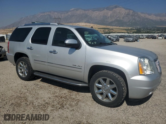 2014 GMC Yukon Denali with VIN 1GKS2EEF8ER140799, listed as a Copart auction lot 69584934 with 79,670 mi miles and Salvage Title. Bid and sale history available at carsss.com. Image 4.