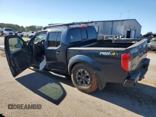 2016 Nissan Frontier Pro-4X z VIN 1N6AD0EV6GN799371, wystawiony jako Copart lot #81292914 z przebiegiem Nie podano mil oraz Szkoda całkowita • Salvage title. Historia ofert i sprzedaży dostępna na DreamBid. Obrazek 2.