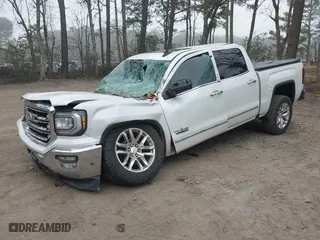 2017 GMC Sierra 1500 SLT with VIN 3GTU2NECXHG496153, listed as a IAAI auction lot 41787068 with 115,091 mi miles. Bid and sale history available at carsss.com. Image 20.