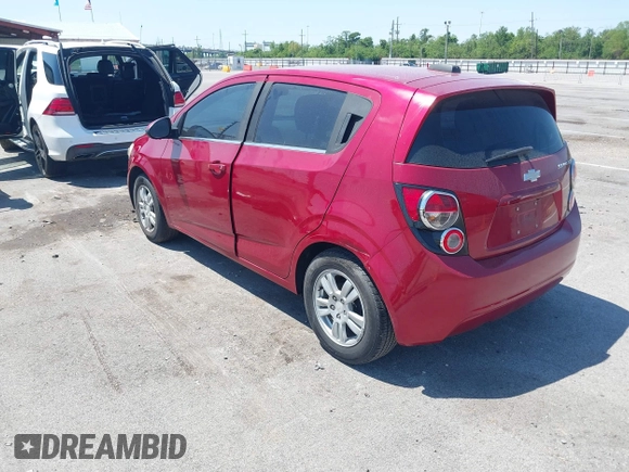 2016 Chevrolet Sonic LT with VIN 1G1JC6SH7G4127373, listed as a IAAI auction lot 41970423 with 130,440 mi miles. Bid and sale history available at carsss.com. Image 3.